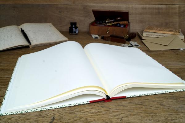 Notebook with hard cover, blank white pages